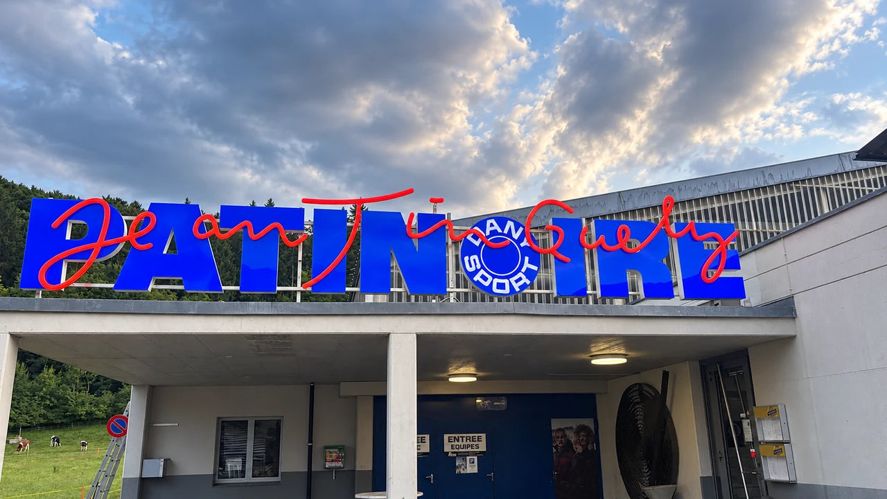 Completed PATINOIRE Jean Tinguely sign installed in the canton of Fribourg.
