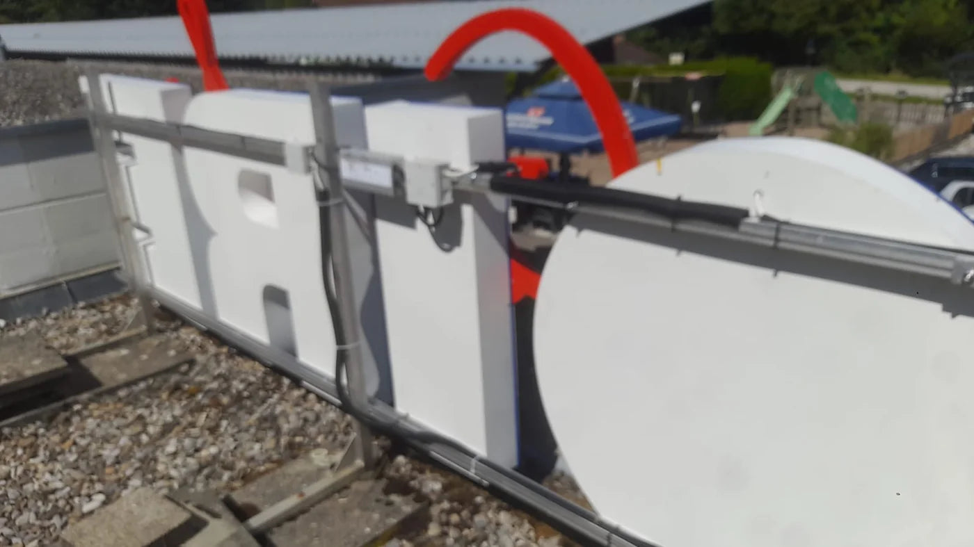Rear view of the letters and their metal mounting structure on the roof.
