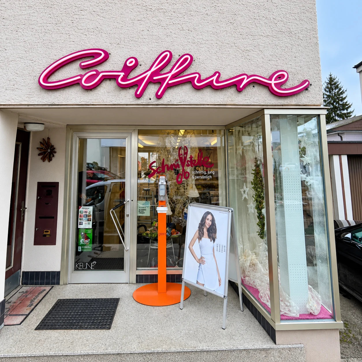 Completed illuminated Coiffure sign installed in Konolfingen.