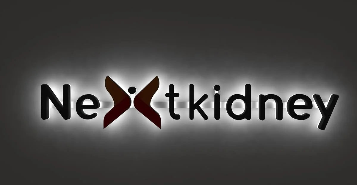 Design visualisation of the Nextkidney sign in a dark setting, illustrating the halo behind the logo and letters.